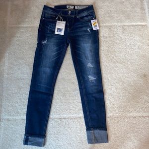 Indigo Rein mid-rise distressed ankle jeans. Has stretch.